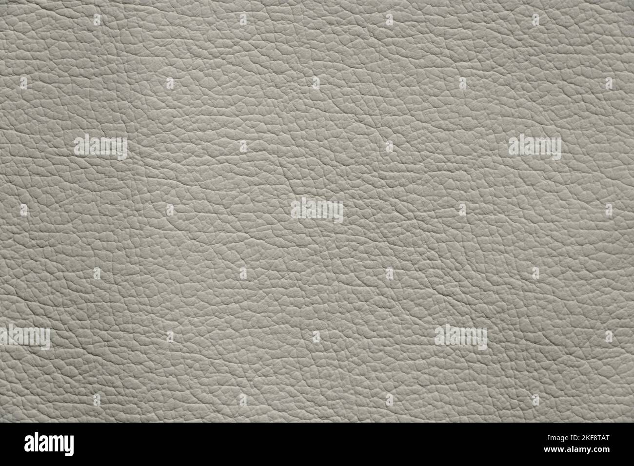 light gray background from genuine leather, solid gray background close-up Stock Photo