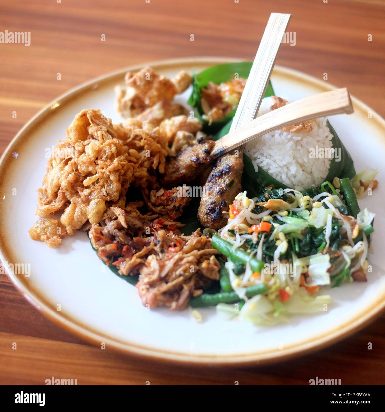 Nasi Campur Bali. Balinese dish of steamed rice with variety of side