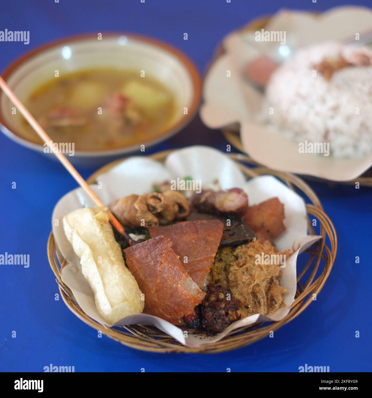 Balinese typical food, nasi babi guling specialty consisting of pork meat, pork belly, pork skin Stock Photo