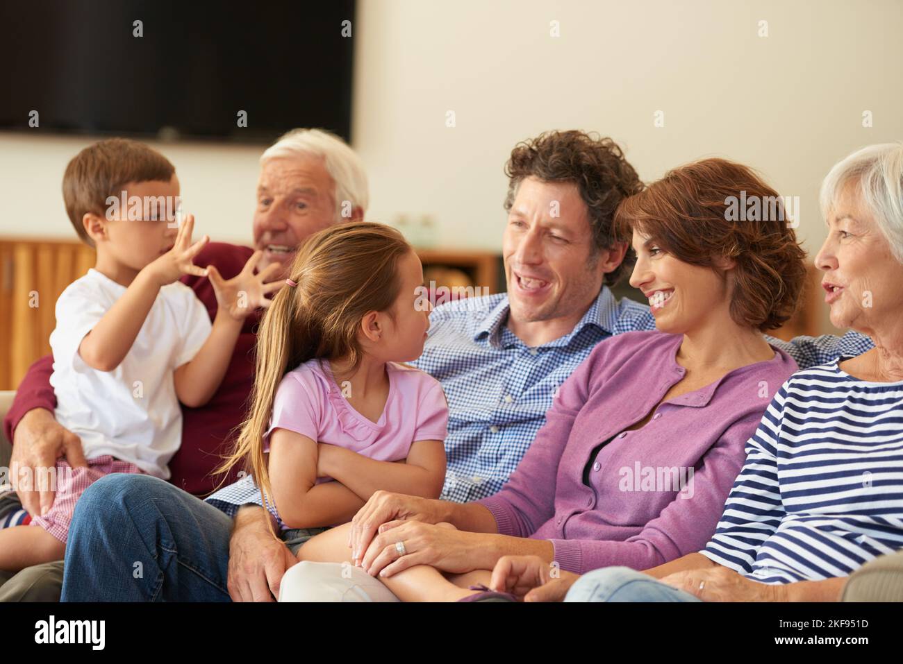 Getting together as a family. a multi generational family sitting on a