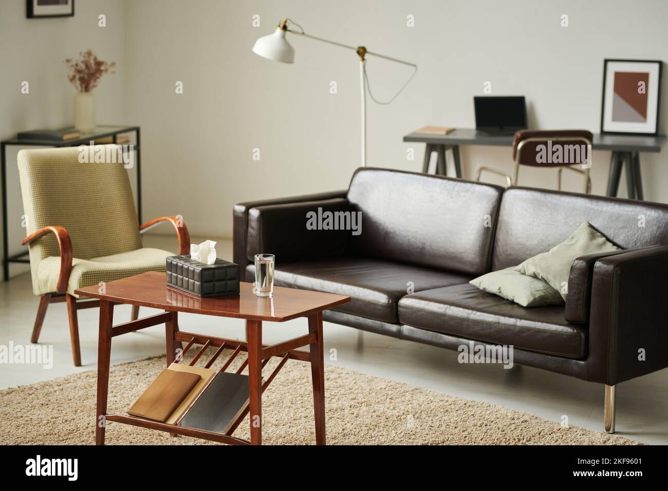 Modern office of psychologist with sofa and armchair for psychotherapy