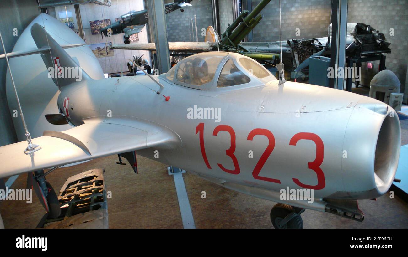 Silver Jet Airplane in Museum Red Numbers Stock Photo