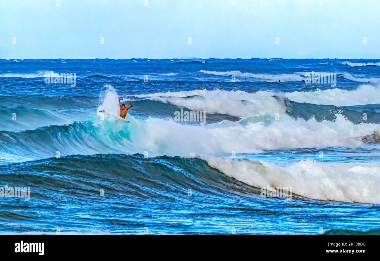 Colorful Surfer Banzai Pipeline North Shore Oahu Hawaii. One of the most famous surfing spots Stock Photo