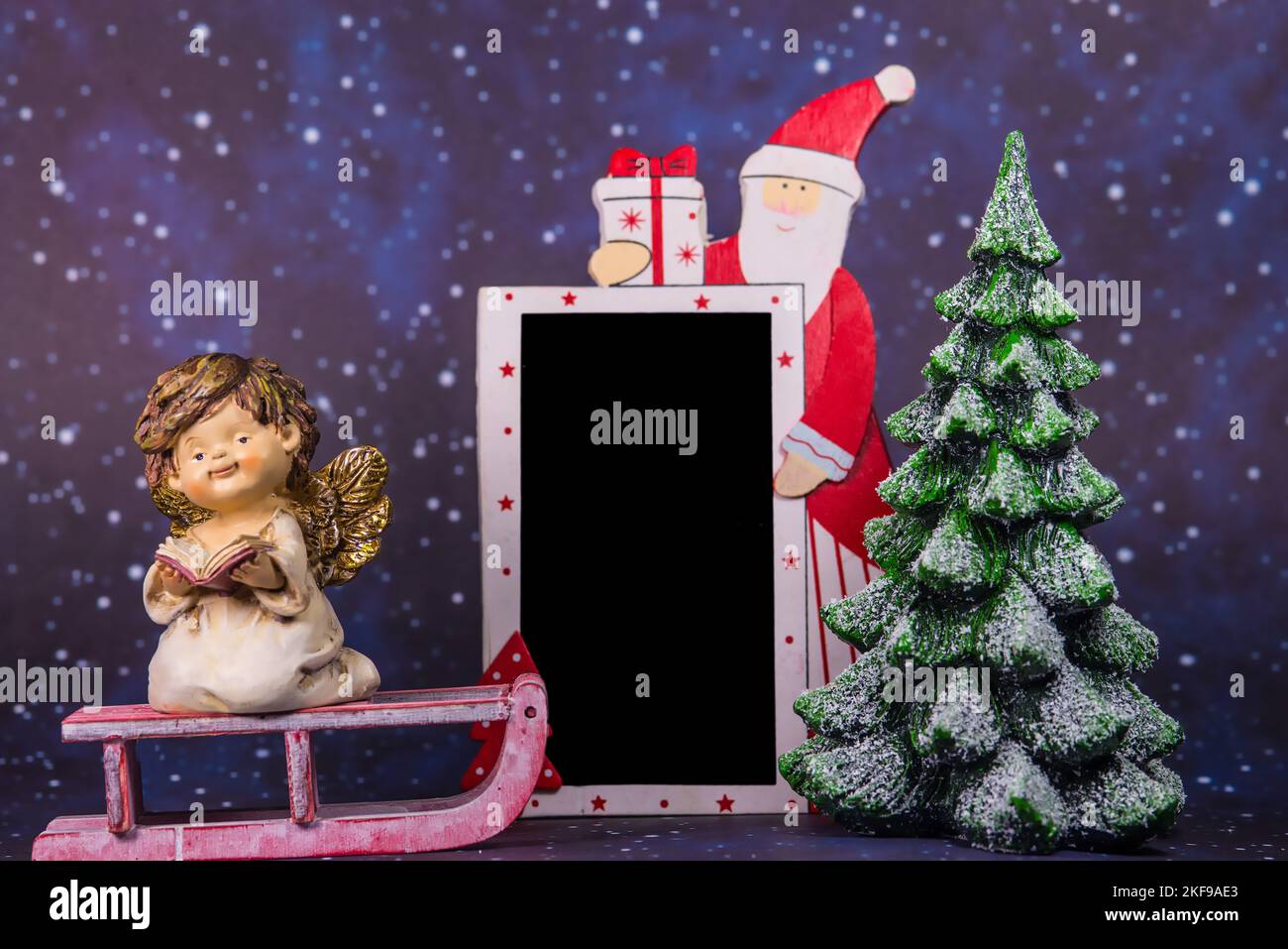 Santa Claus with empty blackboard Stock Photo - Alamy