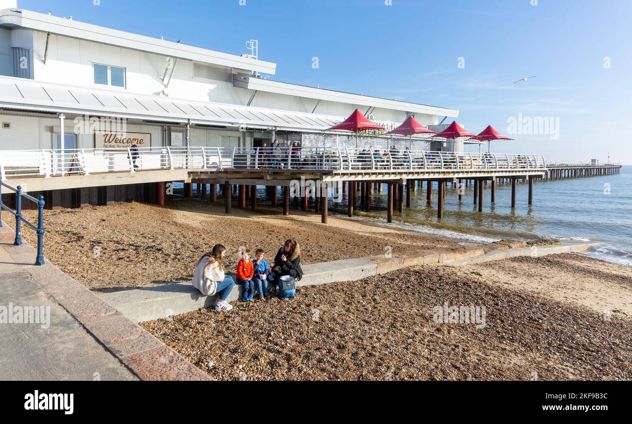 Sandy beach and pier on seafront, Felixstowe, Suffolk, England, UK Stock Photo