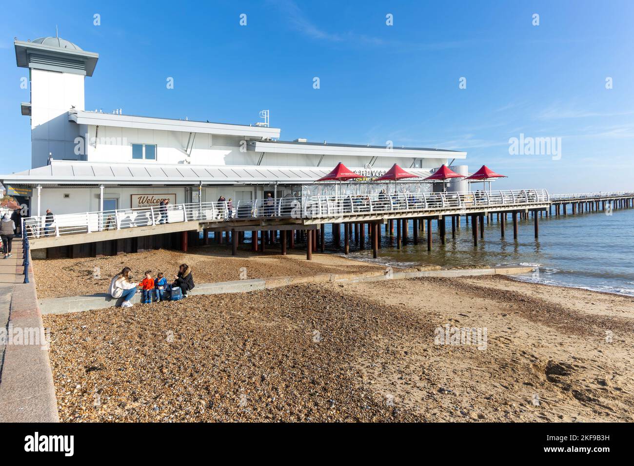Sandy beach and pier on seafront, Felixstowe, Suffolk, England, UK Stock Photo