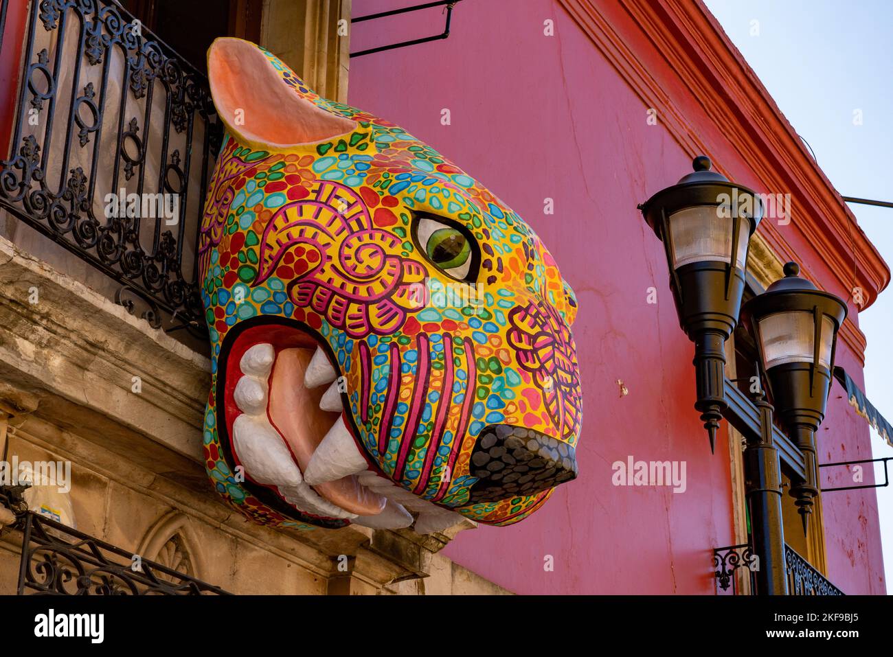 A large papier-mache jaguar alebrije decoration over the street during the Day of the Dead celebration in Oaxaca, Mexico. Stock Photo