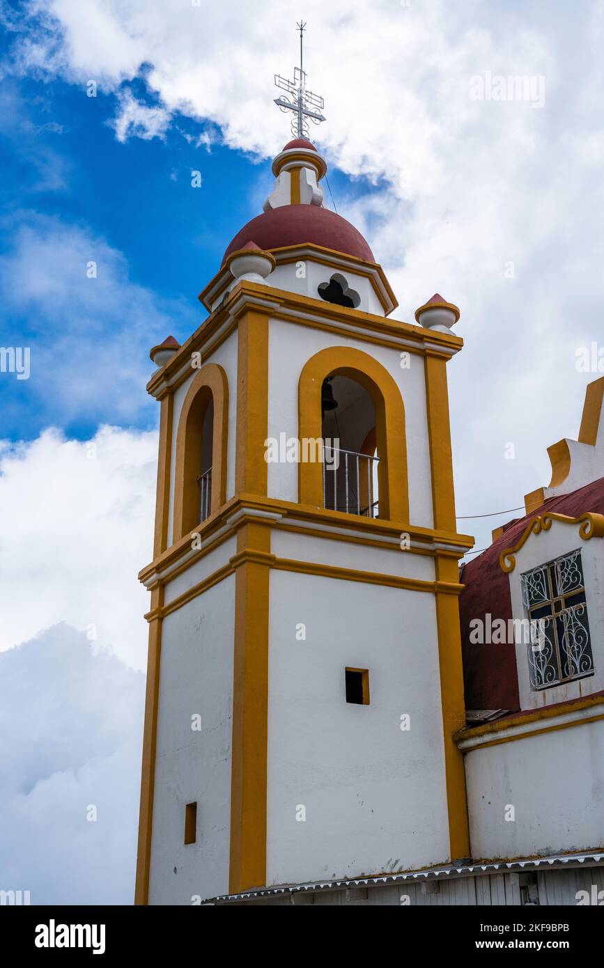 The bell tower of the colonial Church of San Miguel the Archeangel in San Miguel Suchixtepec,  Oaxaca, Mexico. Stock Photo