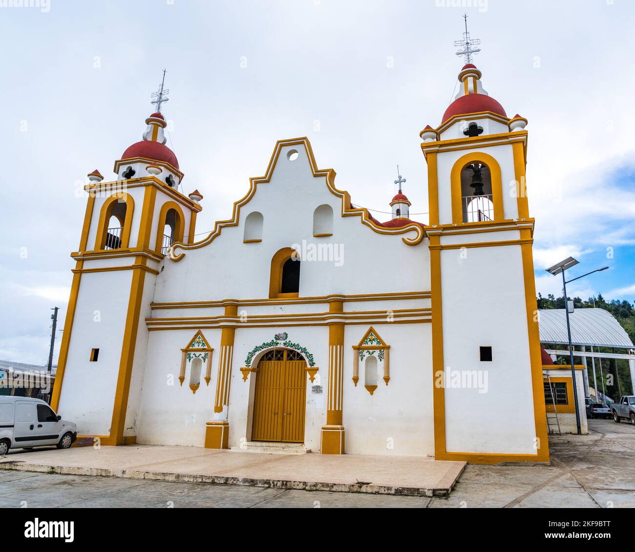 The facade & bell towers of the colonial Church of San Miguel the Archeangel in San Miguel Suchixtepec,  Oaxaca, Mexico. Stock Photo