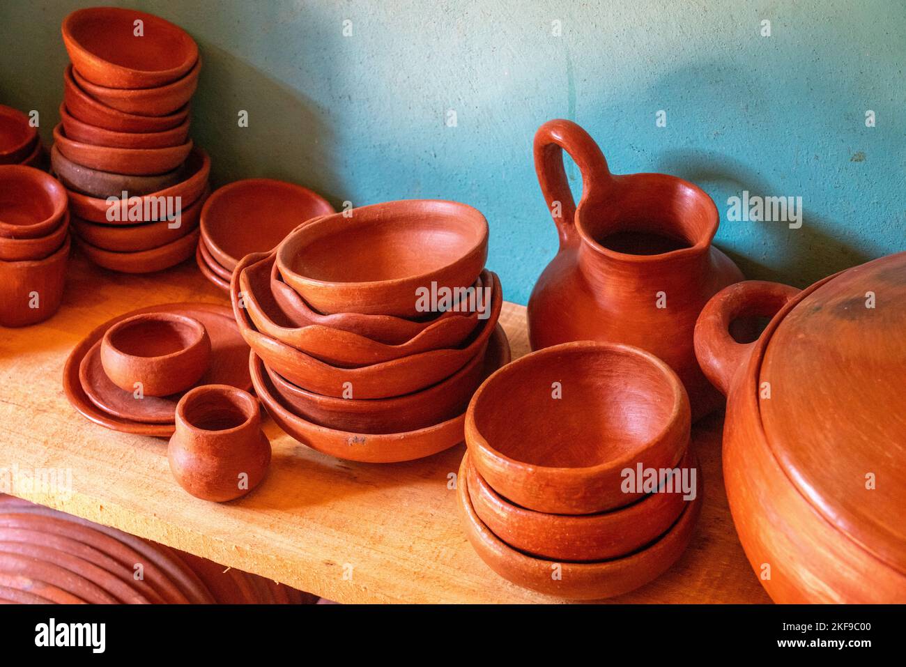 Traditional red clay pottery kitchenware or dinnerware made by hand
