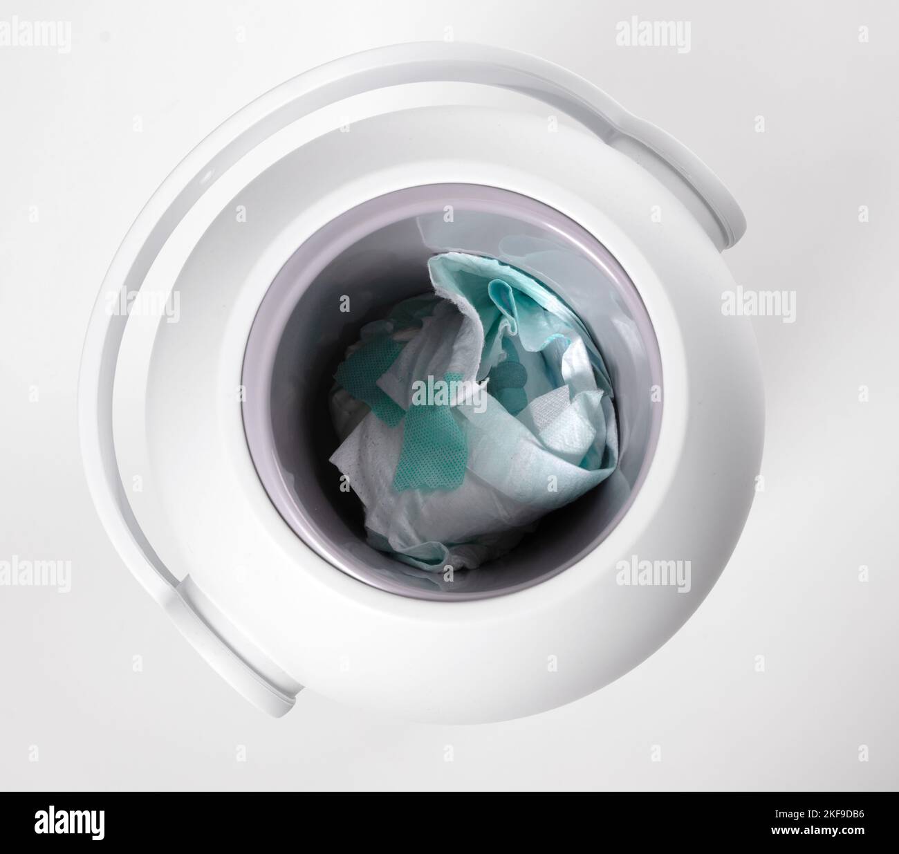 Diapers waste, dirty diaper in garbage pail, selective focus Stock