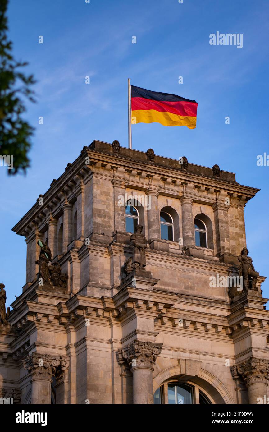 The German flag over Reichstag Building in Berlin Stock Photo