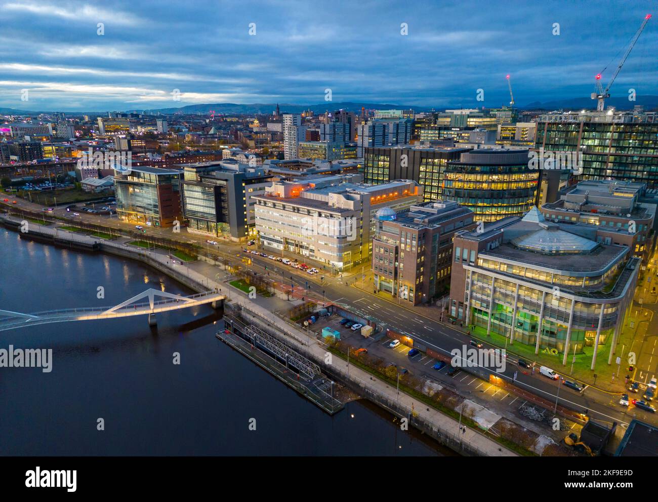 Aerial view from drone at dusk of skyline of Glasgow and River Clyde at Broomielaw and Atlantic Quay, Scotland, UK Stock Photo