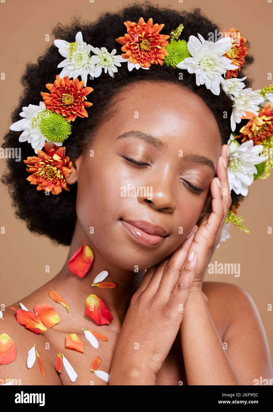 Beauty flower, crown or relax black woman in brown studio background ...