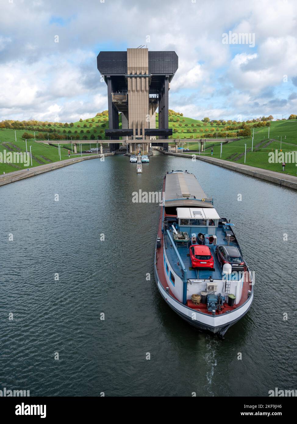 barge near ship elevator of strepy-thieu in canal between brussels and charleroi in belgium Stock Photo