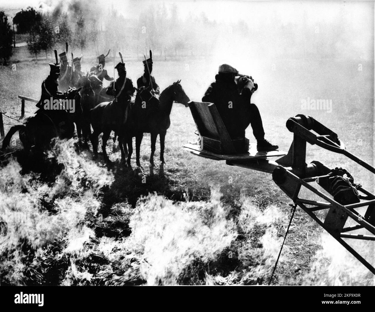 On set location candid in 1963 with Camera Crane during filming of Battle Scene for WAR AND PEACE / VOYNA I MIR 1965 director SERGEY BONDARCHUK novel Lev Tolstoy Mosfilm Stock Photo