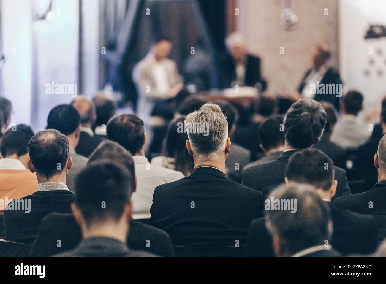 Round table discussion at business convention and Presentation. Audience at the conference hall. Business and entrepreneurship symposium. Stock Photo