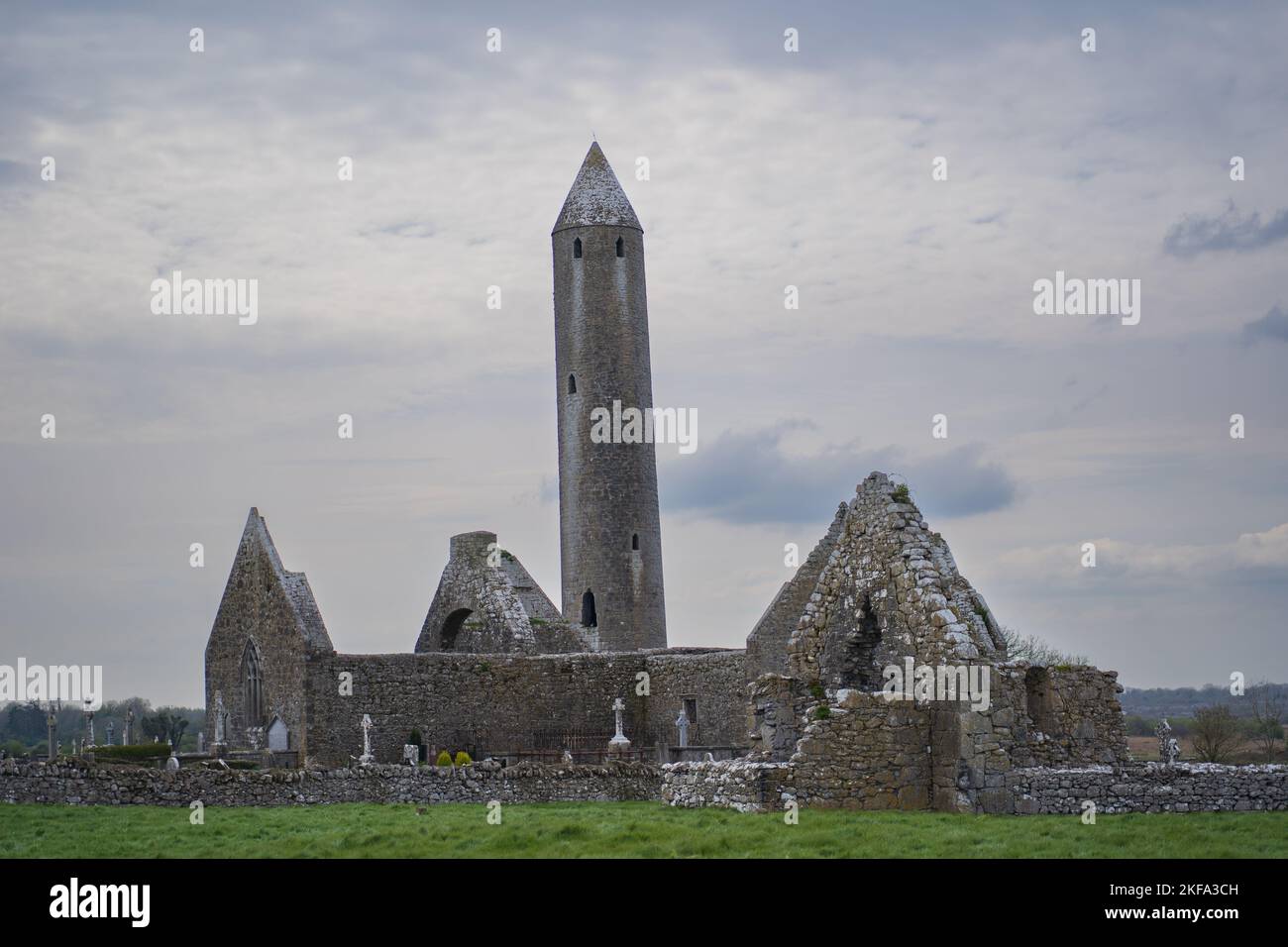 The cloudy sky over the Kilmacduagh monastery in south County Galway, near Gort, Ireland Stock Photo