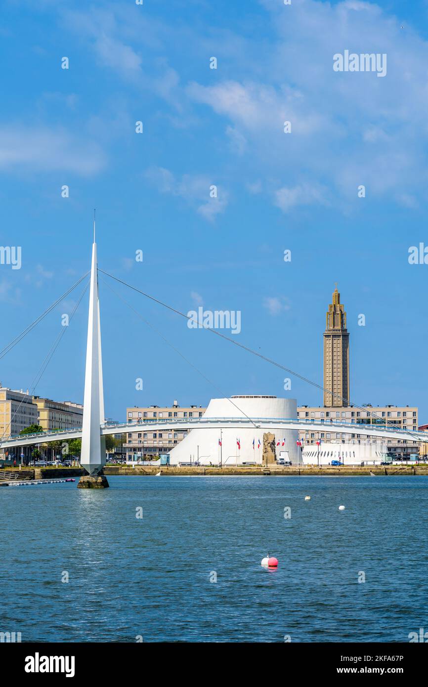 The footbridge of the Commerce basin, the Volcan cultural center and the bell tower of St. Joseph's Church in Le Havre, France. Stock Photo