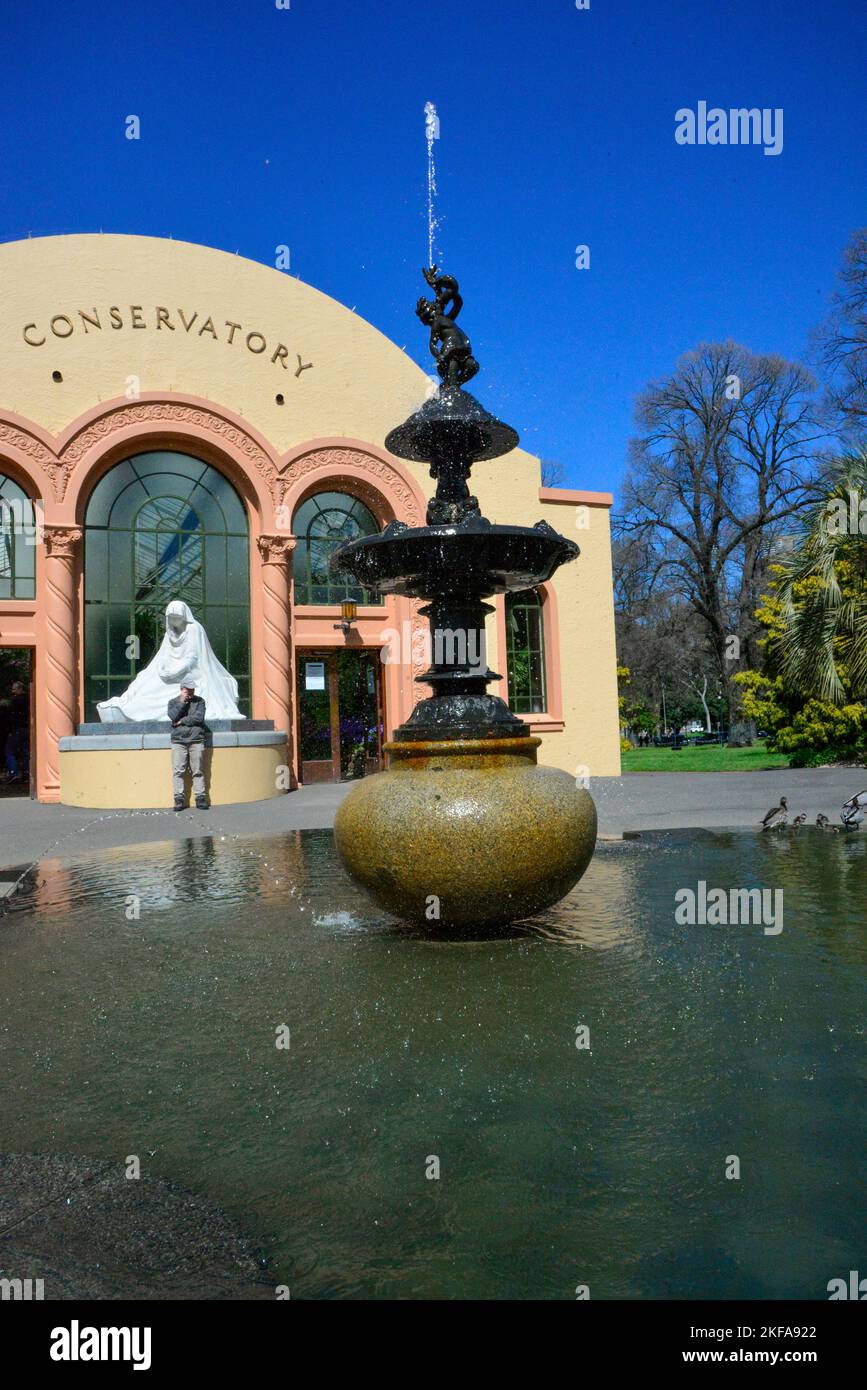 Water Fountains and Statue Fitzroy Gardens on a Bright Sunny Day in Melbourne, Victoria VIC, Australia Stock Photo