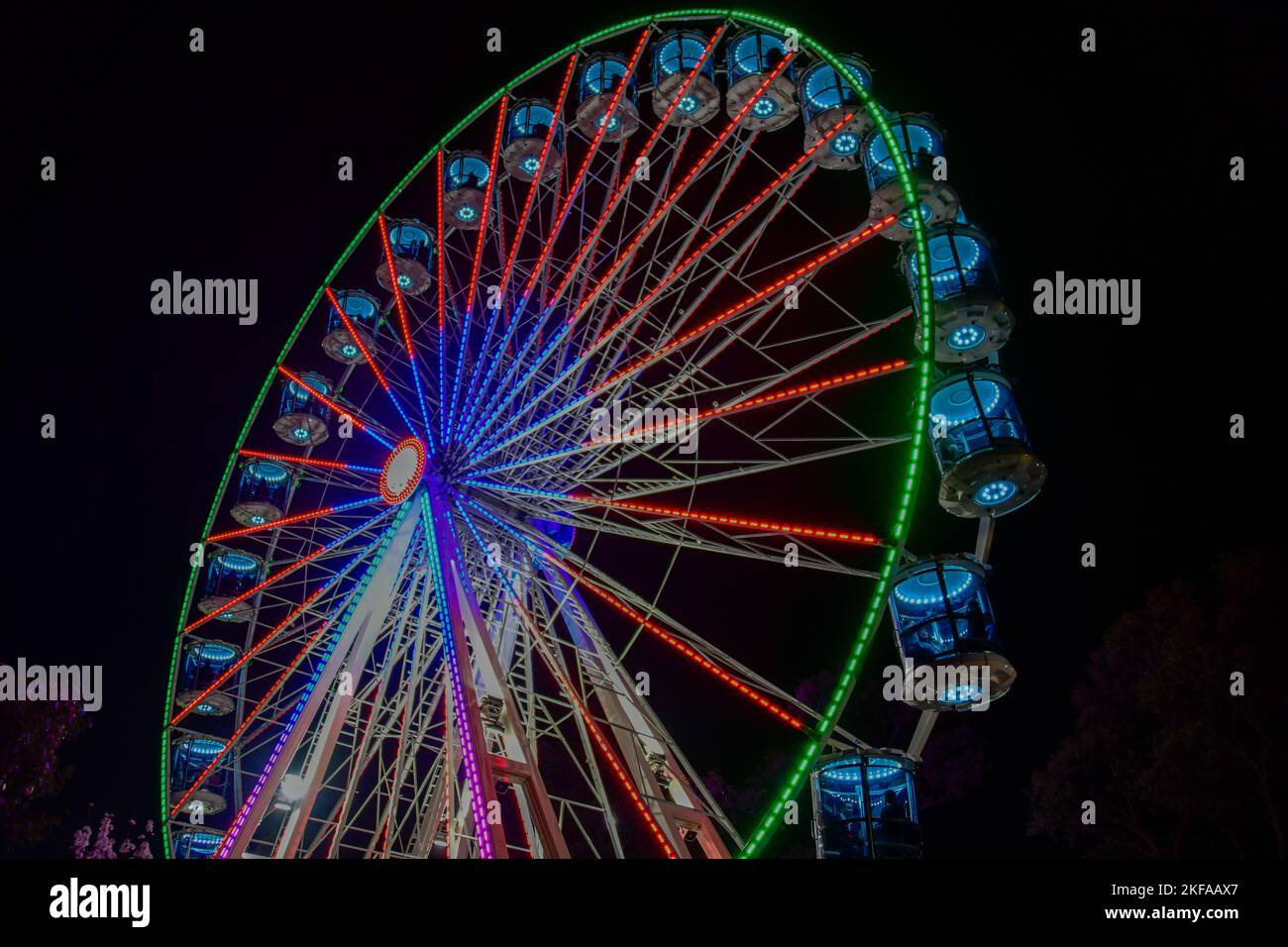 Colourful Ferris Wheel at Night Amusement Rides at The Royal Melbourne Show, Melbourne Victoria VIC, Australia Stock Photo