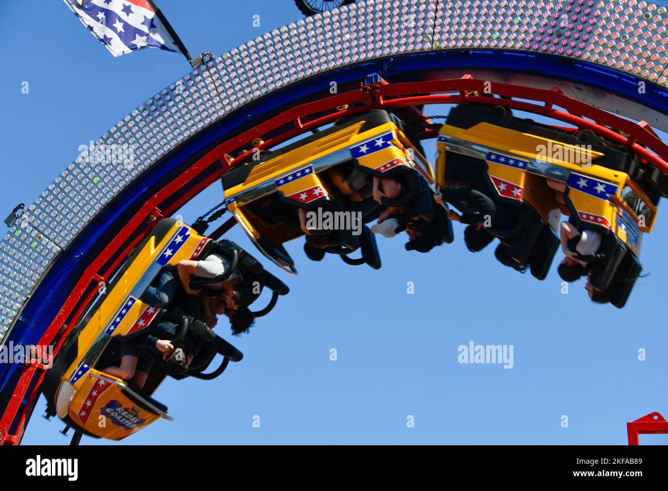Riding Roller Coaster Upside Down with People The Royal Melbourne Show, Melbourne Victoria VIC, Australia Stock Photo