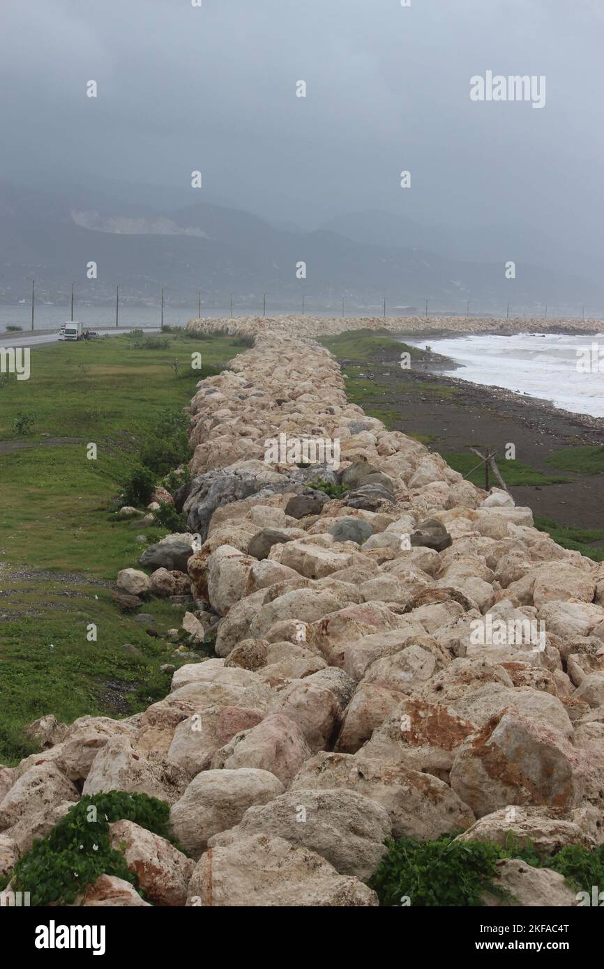 A vertical of a wall of stones in Palisadoes, Jamaica Stock Photo Alamy