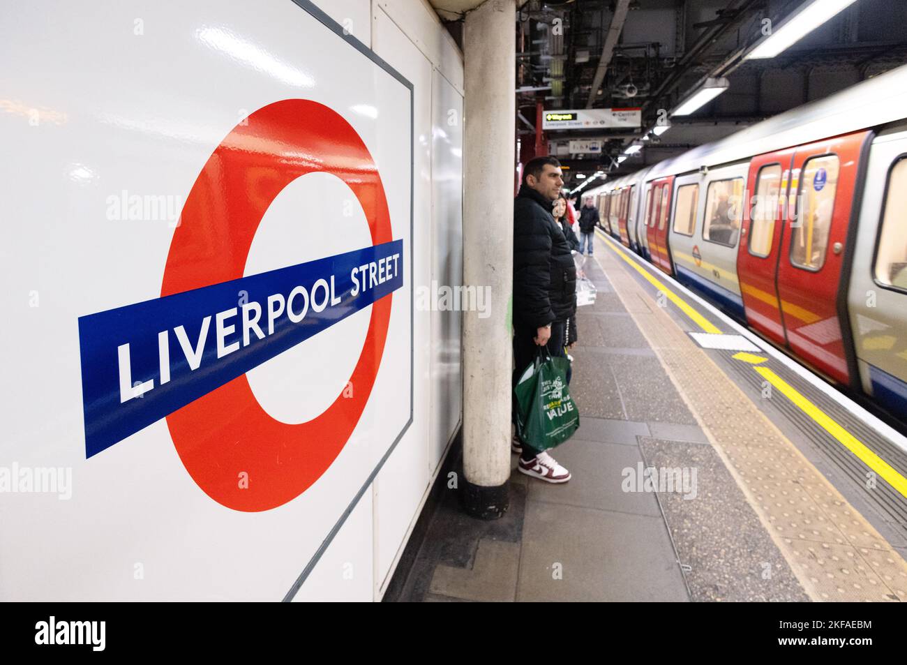 Liverpool Street Underground Station interior, sign and platform,train and people, Public transport, London Tube system, London UK Stock Photo