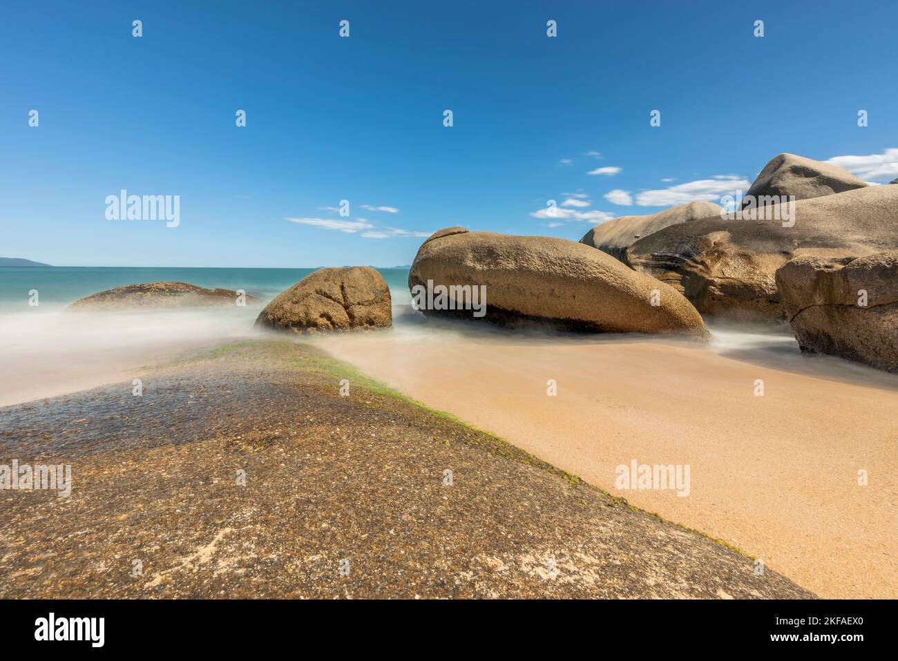 A clear blue sky day at Tainha Beach, a cristaline water paradise in Bombinhas, Santa Catarina, Brazil Stock Photo