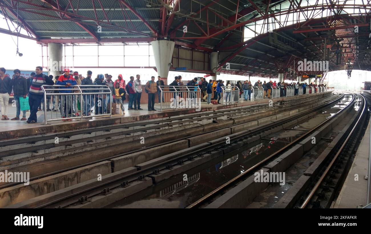 Delhi, India - People wait for metro train in kashmiri gate station. Delhi Stock Photo