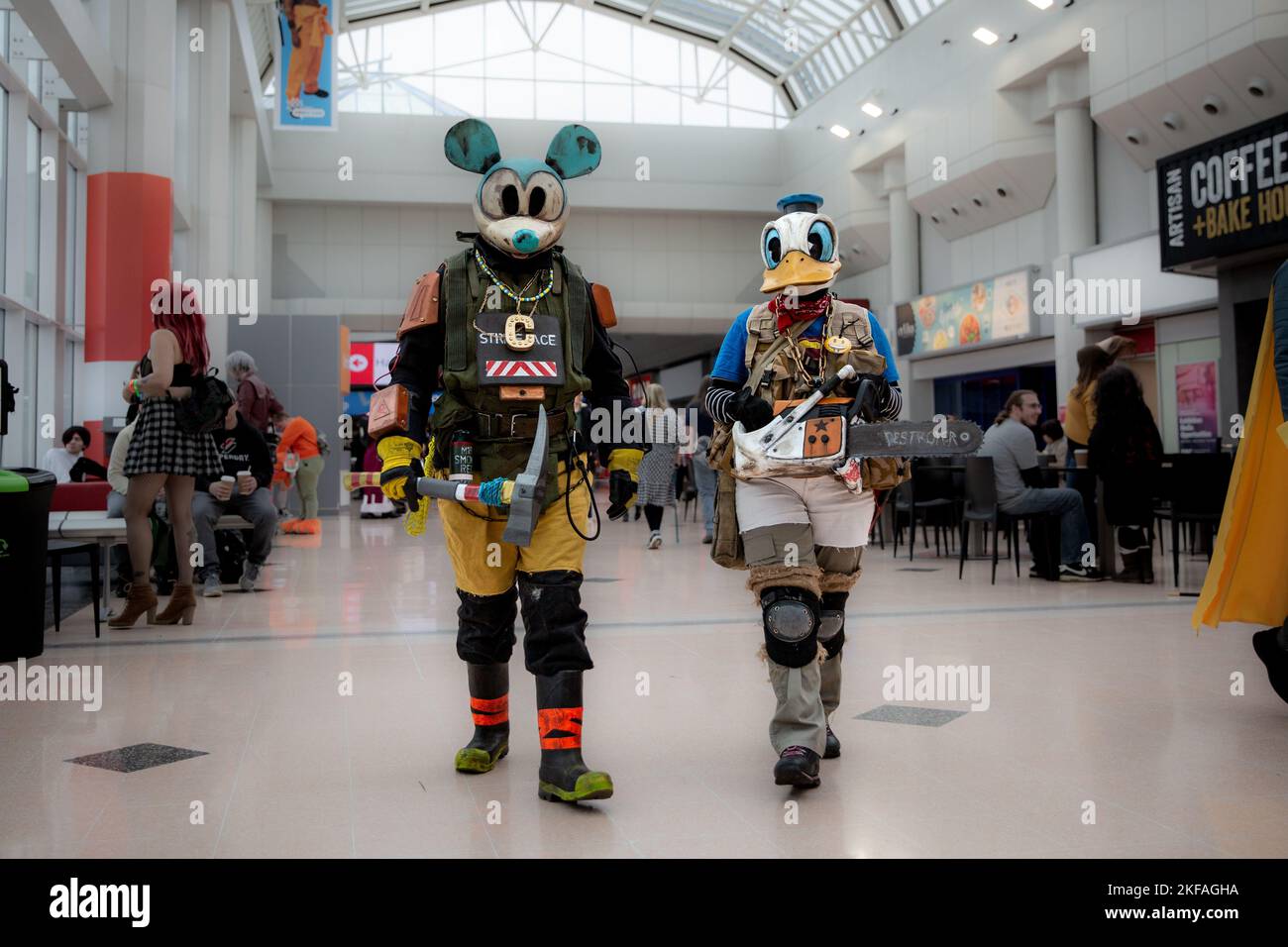 BIRMINGHAM NEC, UK - NOVEMBER 13, 2022. Cosplayers dressed as a Post Apocalyptic Mickey Mouse and Donald Duck from the Badland at a UK comic con event Stock Photo