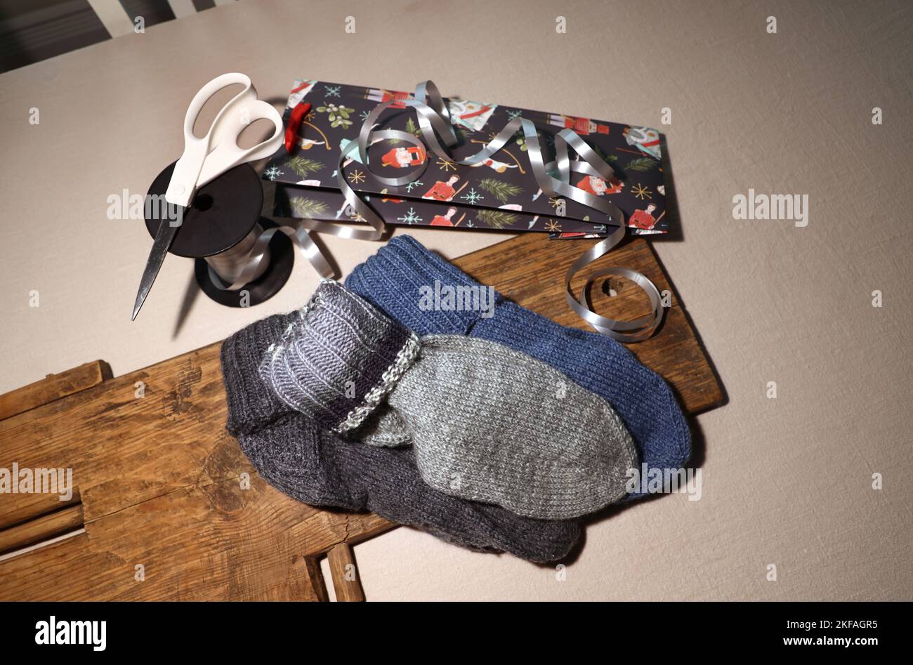Homeknitted socks to be given away as a Christmas present Stock Photo