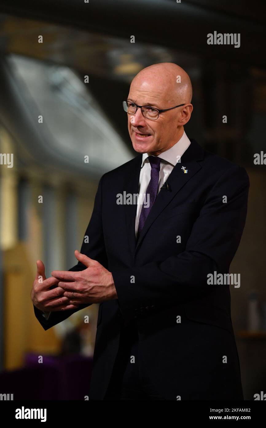 Edinburgh, Scotland, UK. 17th Nov, 2022. PICTURED: John Swinney MSP, Scottish Cabinet Minister for Covid Recovery seen giving interview in the Garden Lobby of the Scottish Parliament in response to the Chancellor - Rishi Sunak's autumn statement. Credit: Colin D Fisher Credit: Colin Fisher/Alamy Live News Stock Photo