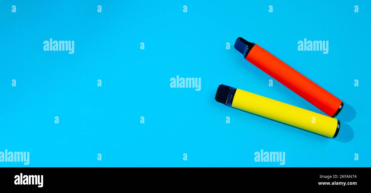 Electronic cigarettes in blue background color with blank space for ...