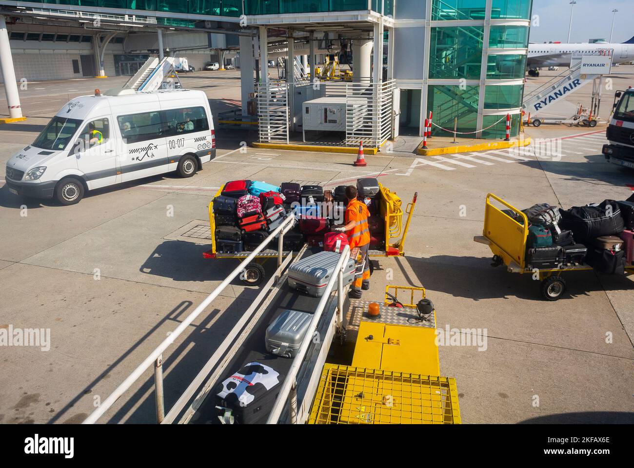 Paris, France, Orly Airport, Baggage Handlers, Loading Airplane for Departure, Tarmac, Conveyer