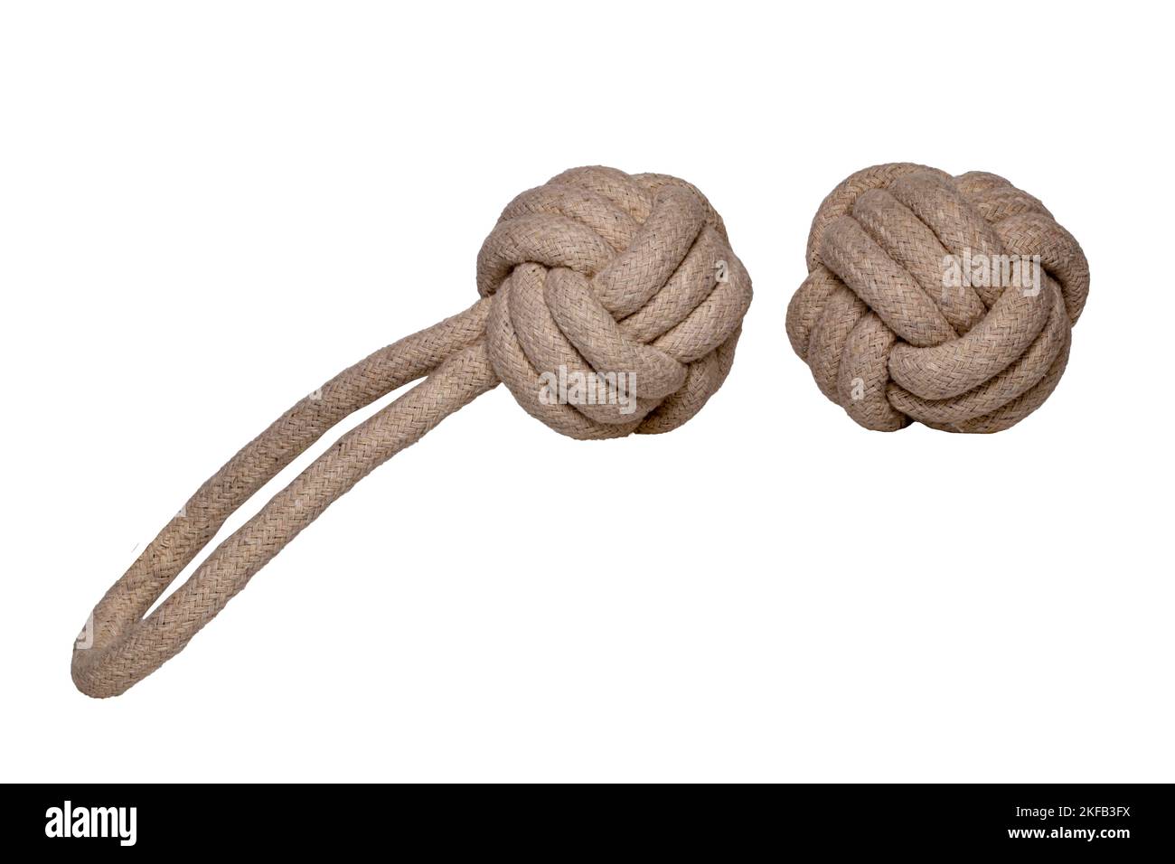Rope isolated. Close-up of two rope knote balls. Macro. Knoted rope dog toy. Stock Photo