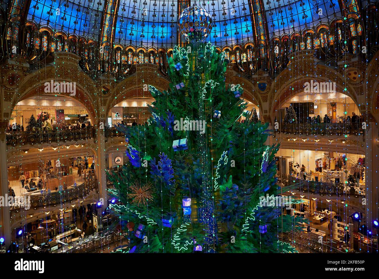 Paris, Ile de France, FRANCE. 17th Nov, 2022. The annual christmas tree in the Galeries Lafayette is installed in the impressive colourfull dome overlooking the interior of the famous department store in Paris. This year the event was called planete sapin, or planet fir tree. (Credit Image: © Remon Haazen/ZUMA Press Wire) Stock Photo