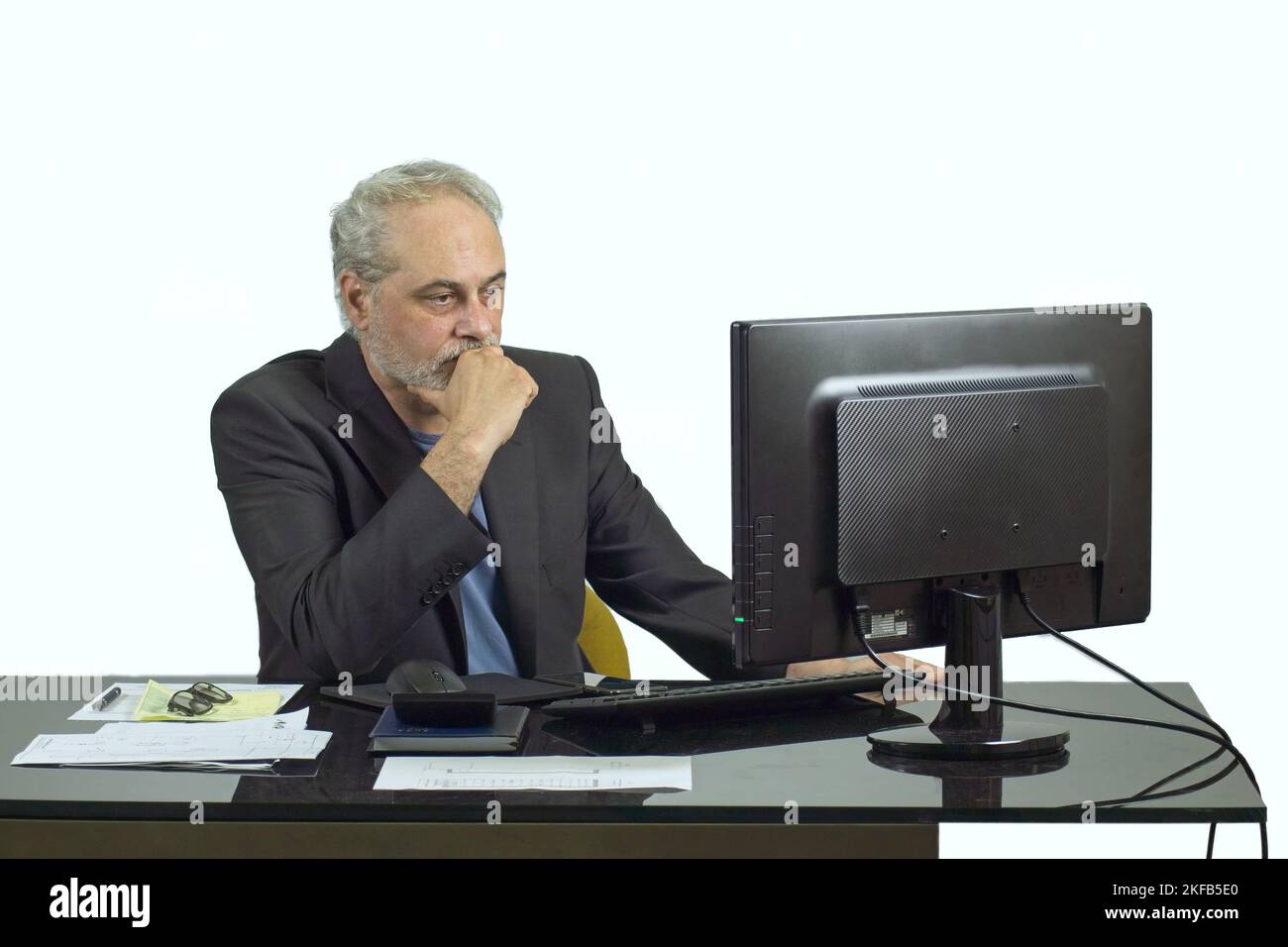 businessman working with a computer on a desktop on a white background Stock Photo