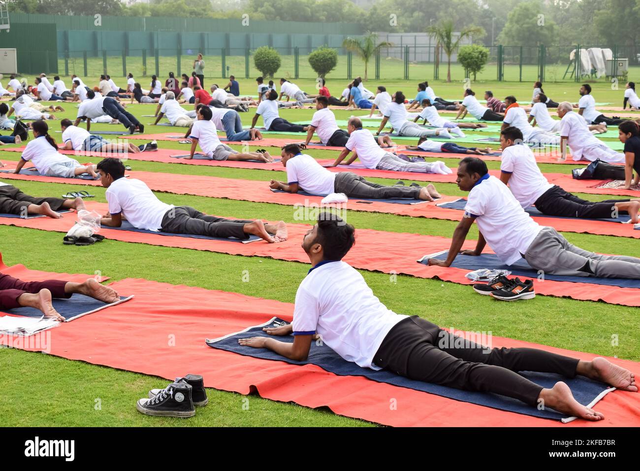 New Delhi, India, June 21 2022 Group Yoga exercise session for people