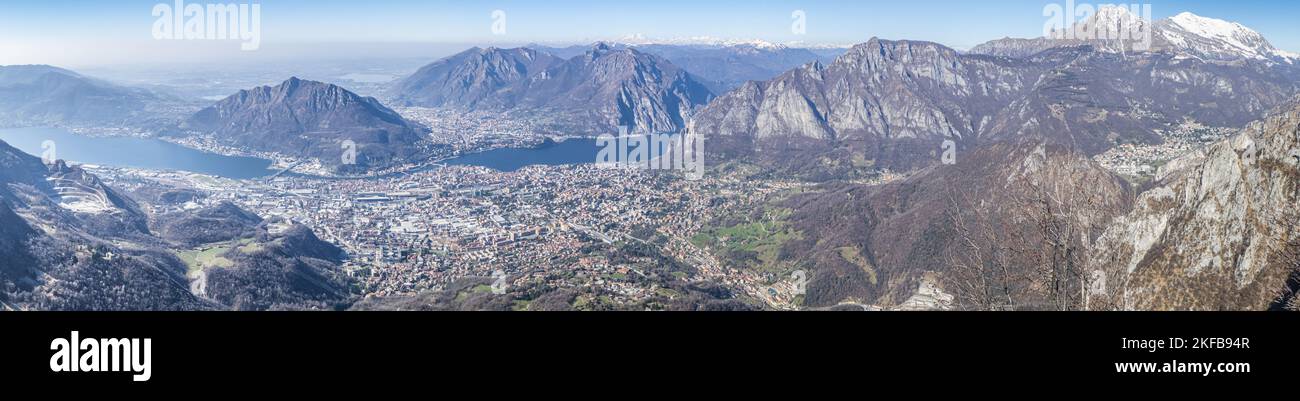 Extra wide view of the Lake of Lecco and the Lake of Garlate and the sorrounding mountains Stock Photo