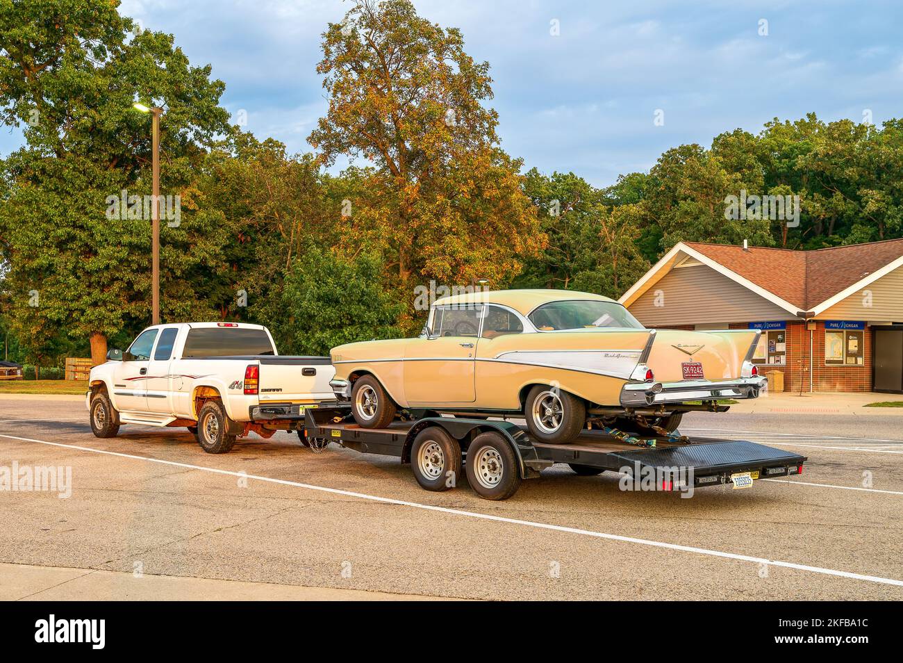 Carleton MI - September 17, 2022: 57 Chevy on a trailer being hauled by pickup Stock Photo