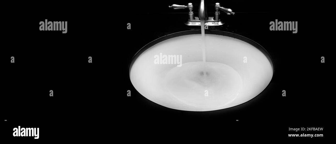 Bathroom sink with water flowing clean design black bathroom sink
