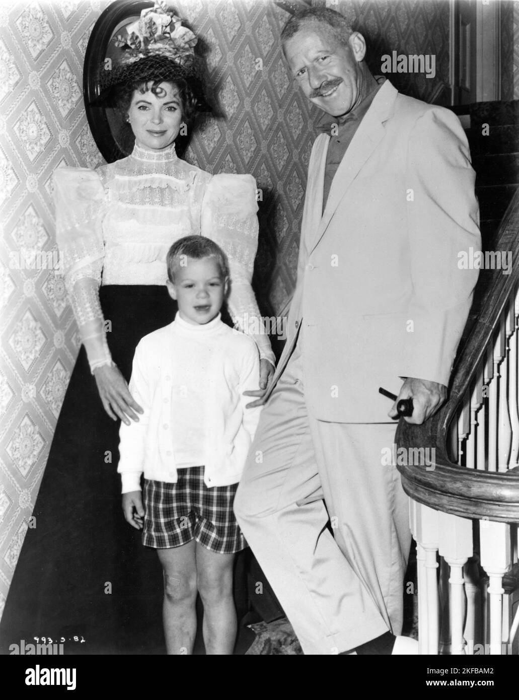 DOROTHY McGUIRE on set candid with her husband photographer JOHN SWOPE and their son MARK SWOPE during filming of THE REMARKABLE MR. PENNYPACKER 1959 director HENRY LEVIN play Liam O'Brien costume design Charles Le Maire and Mary Wills producer Charles Brackett Twentieth Century Fox Stock Photo