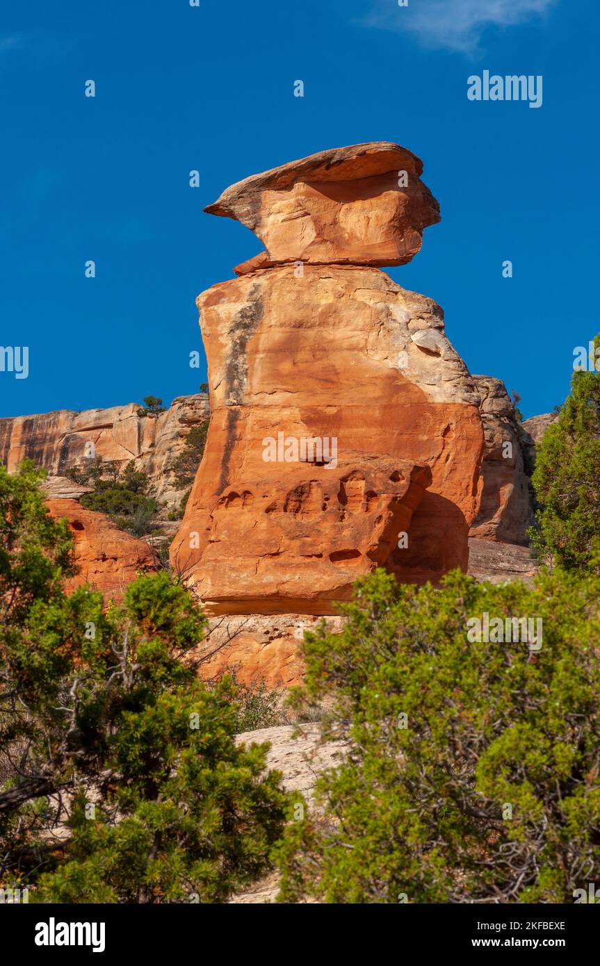 A beautiful and stately red rocks rock formation at the Garden of the Gods in Colorado Springs, Colorado rising high into a blue sky. Stock Photo