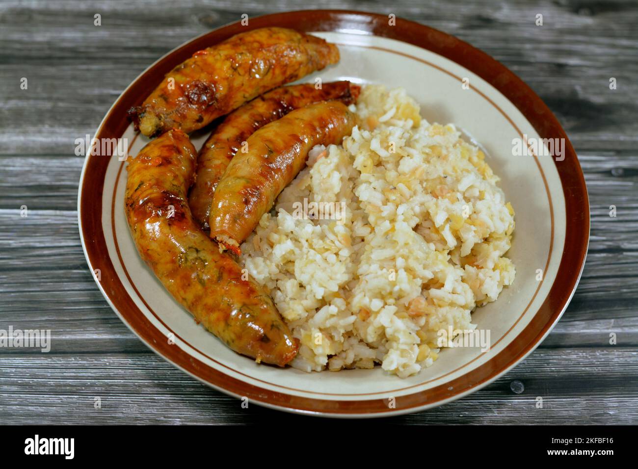 Egyptian hot steamed white rice with yellow lentils Koshary and deep