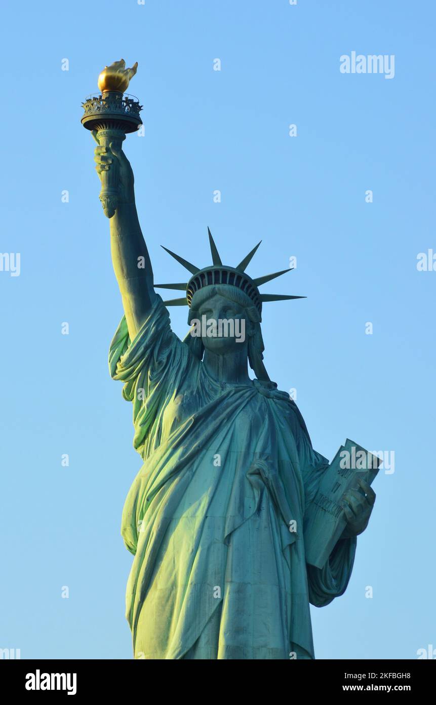 A vertical shot of the New York City Statue of Liberty Stock Photo