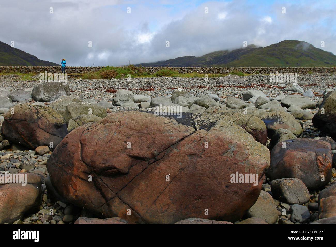 Big Red-Coloured Rocks and Stony Strand at Loch Buie, Lochbuie, Mull, Isle of Mull, Hebrides, Inner Hebrides, Inner Isles, Scotland, United Kingdom Stock Photo
