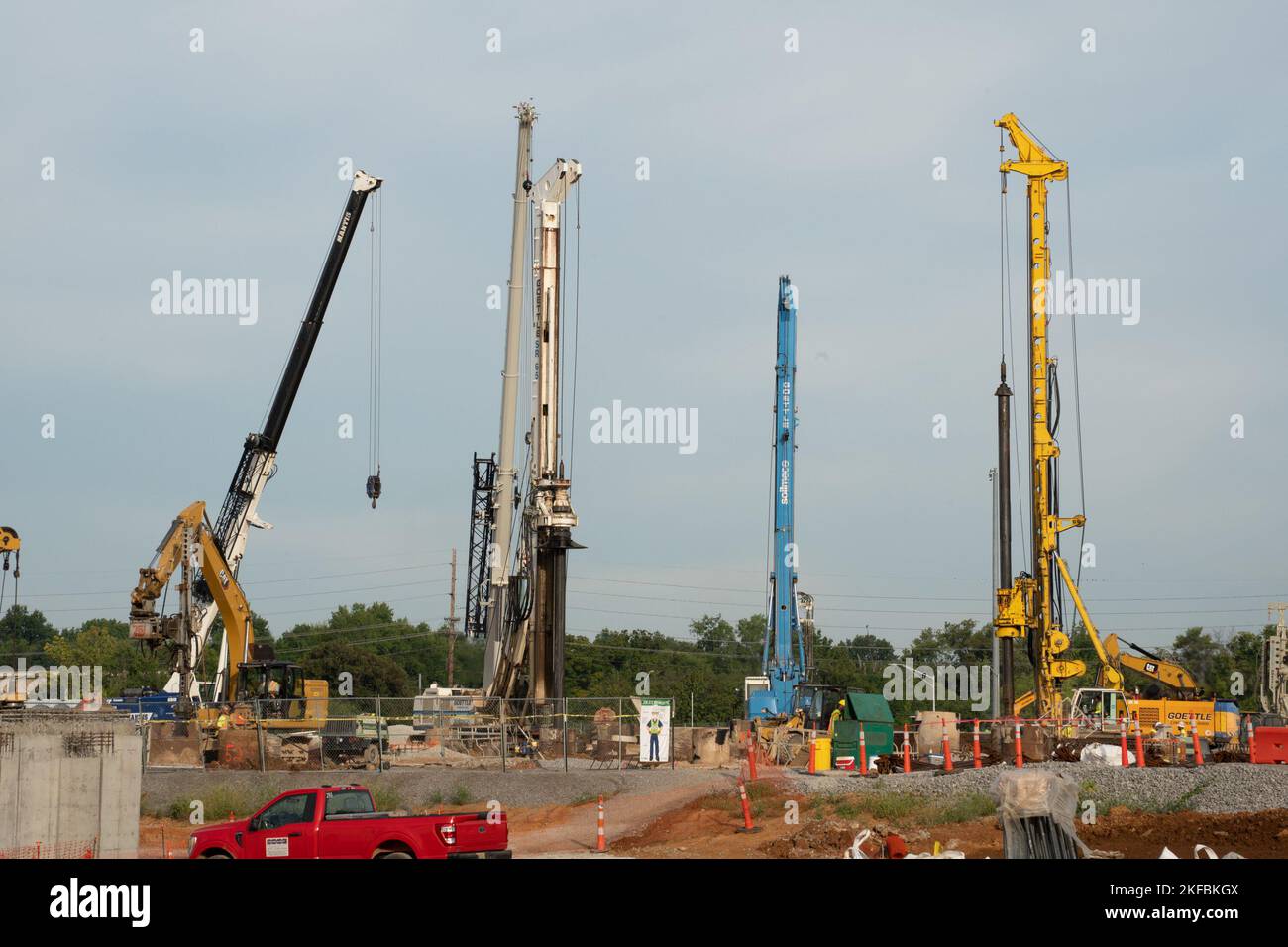 Multiple drill rigs work on creating drilled piers for the foundation of  the North Parking Garage of the Louisville VA Medical Center, in  Louisville, Kentucky Sept. 2, 2022. Construction of the facility