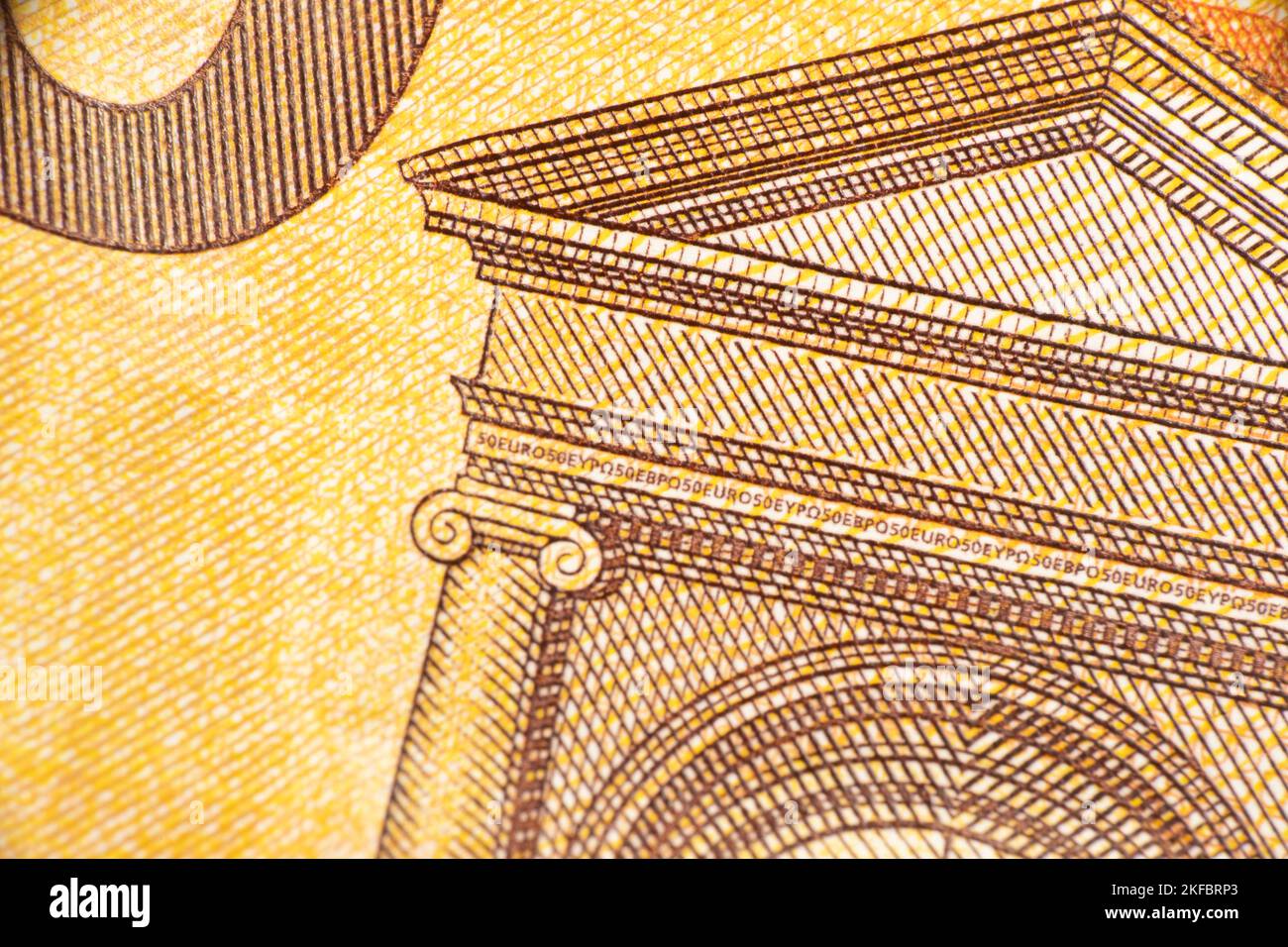 Close up macro fragment part of 50 euro money banknote. World money concept, inflation and economy concept. Finance and business. Stock Photo