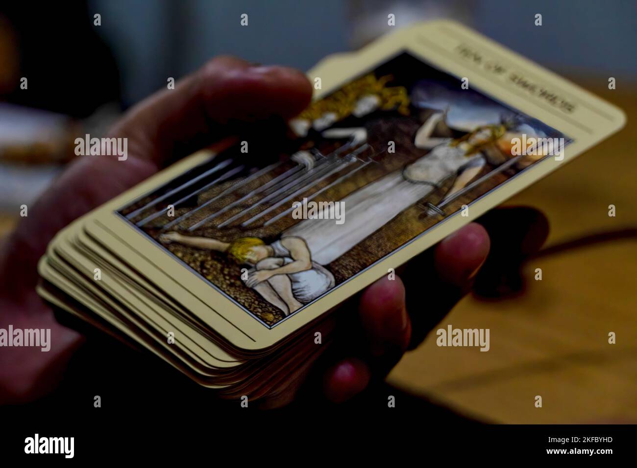 young man reading tarot cards to his client, mexico latin america Stock